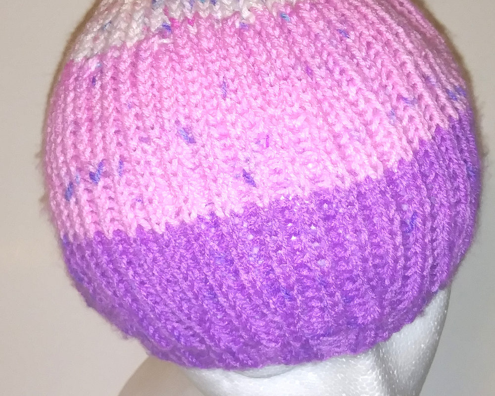 brioche tam on mannequin head, top view